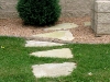 Quick focus on this simple solution to let grounds crew get back to hose hook-ups, etc: Chilton flagstone steppers.